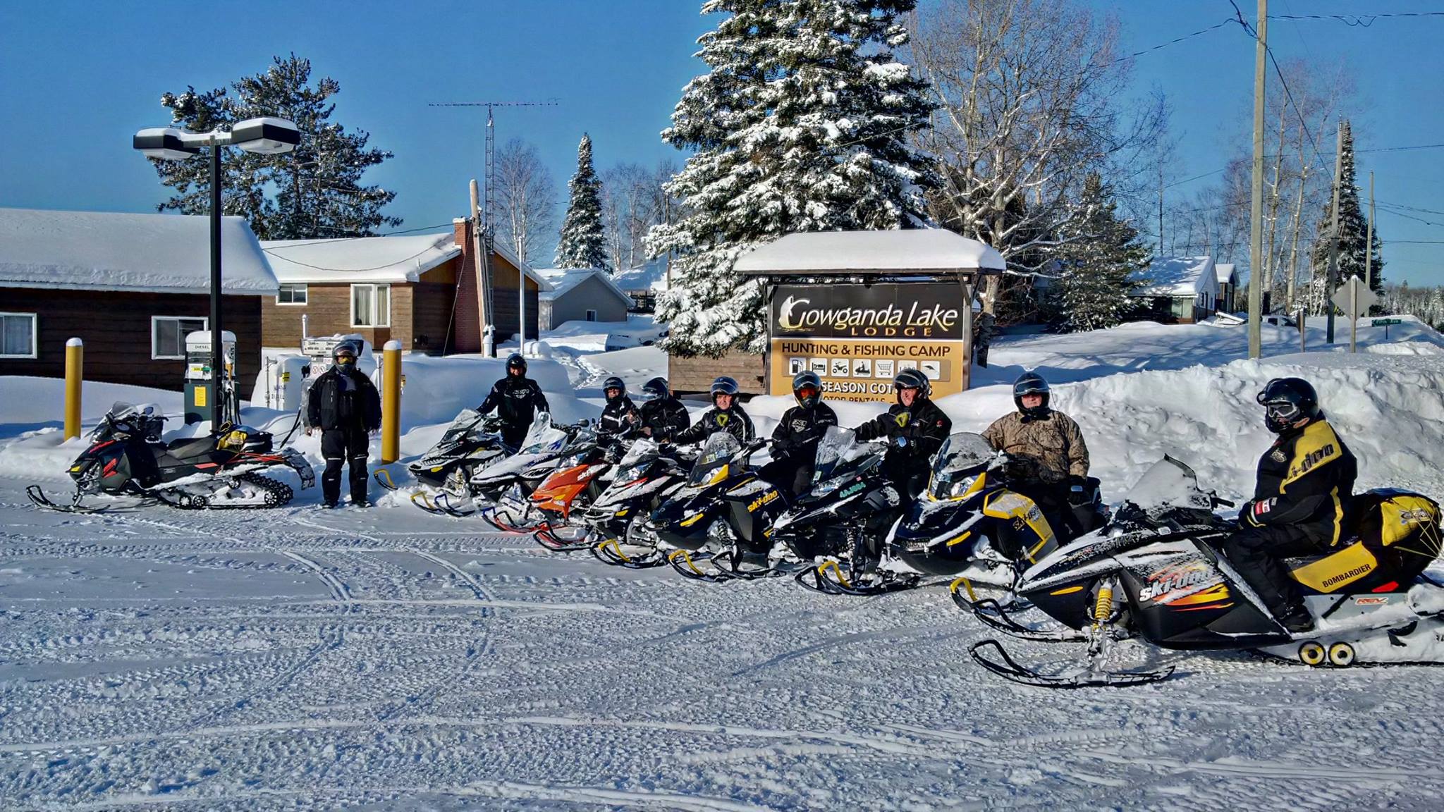 Gowganda Lake snowmobilers and sign