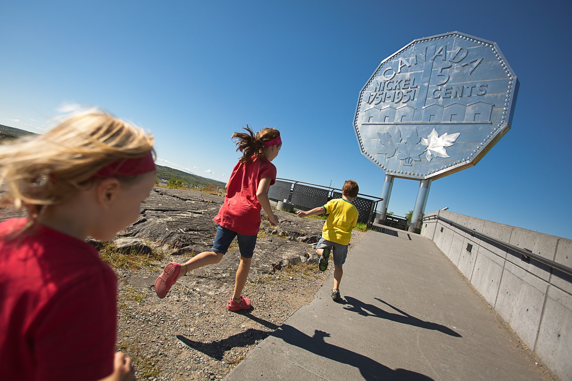 kids running to the Sudbury Nickel