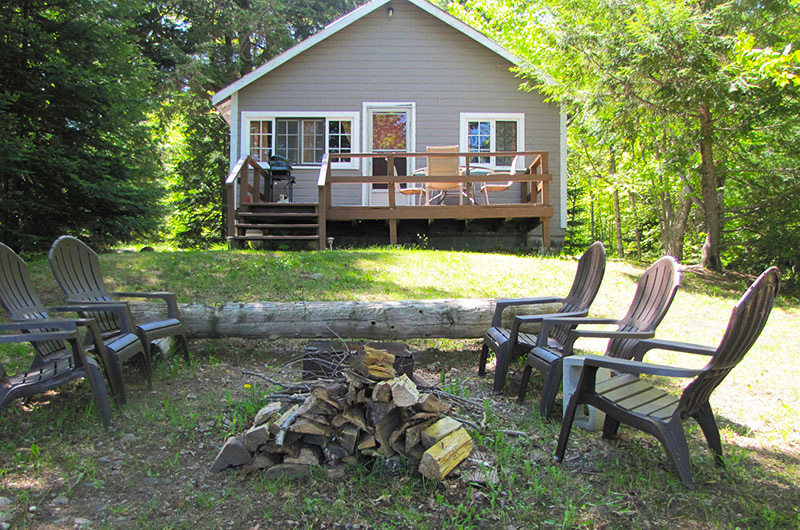 Housekeeping Cottage with fire pit and chairs