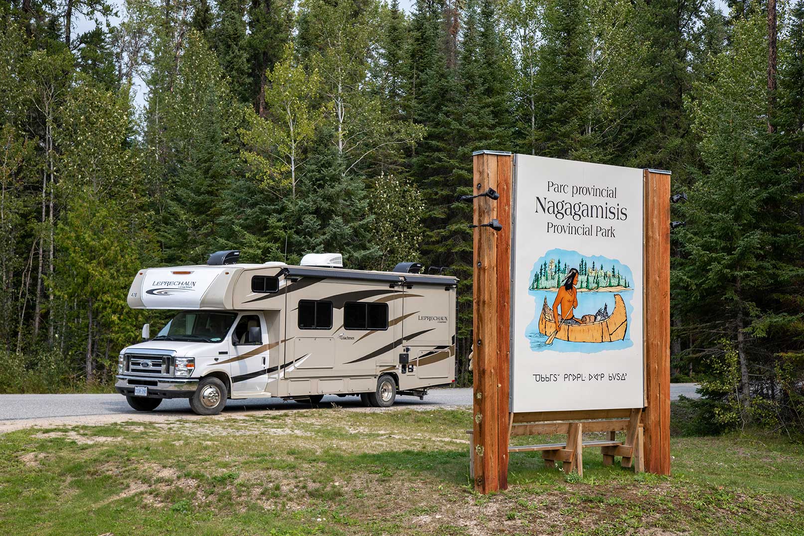 Nagagamisis Provincial Park welcome sign and RV