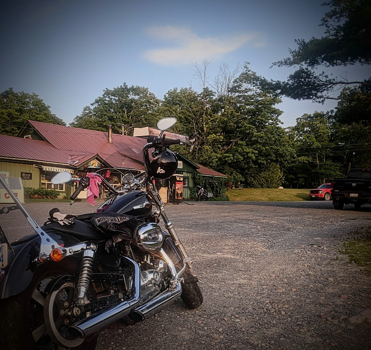 motorcycle parked outside black creek outfitters