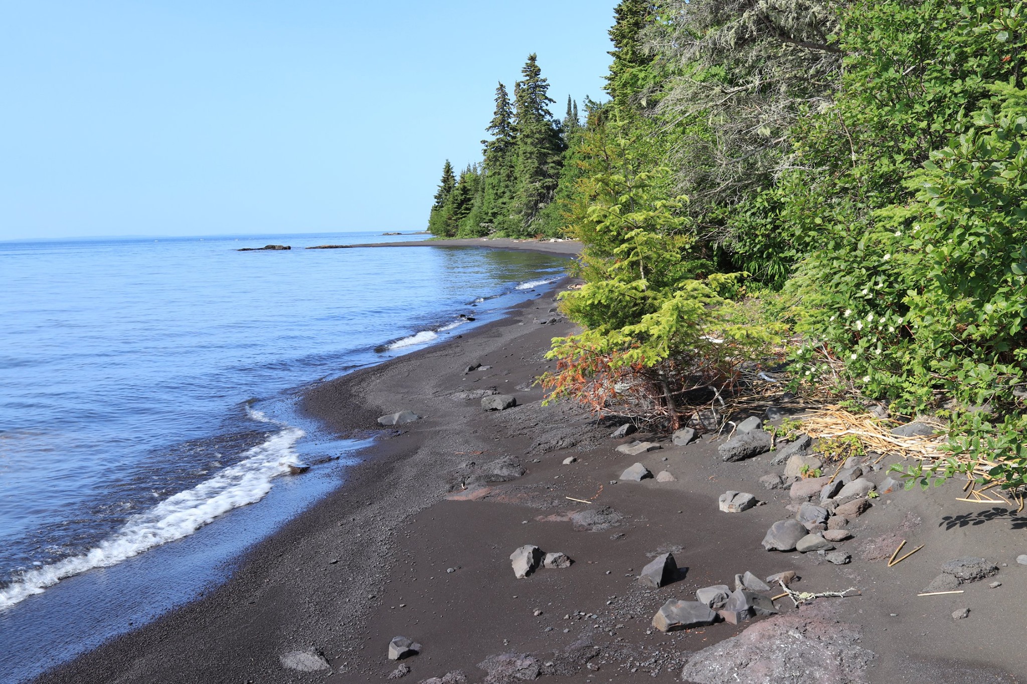 Porphyry Island Black Sand Beach