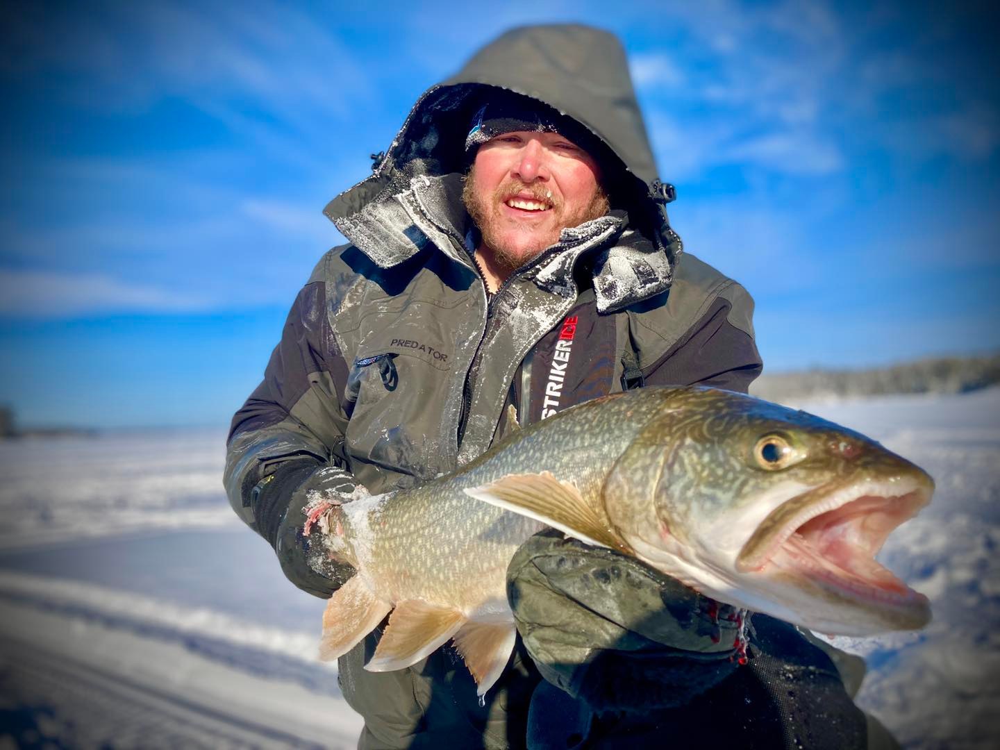 Ice fishing for lake trout at Vic & Dot's Camp on Whitefish Bay