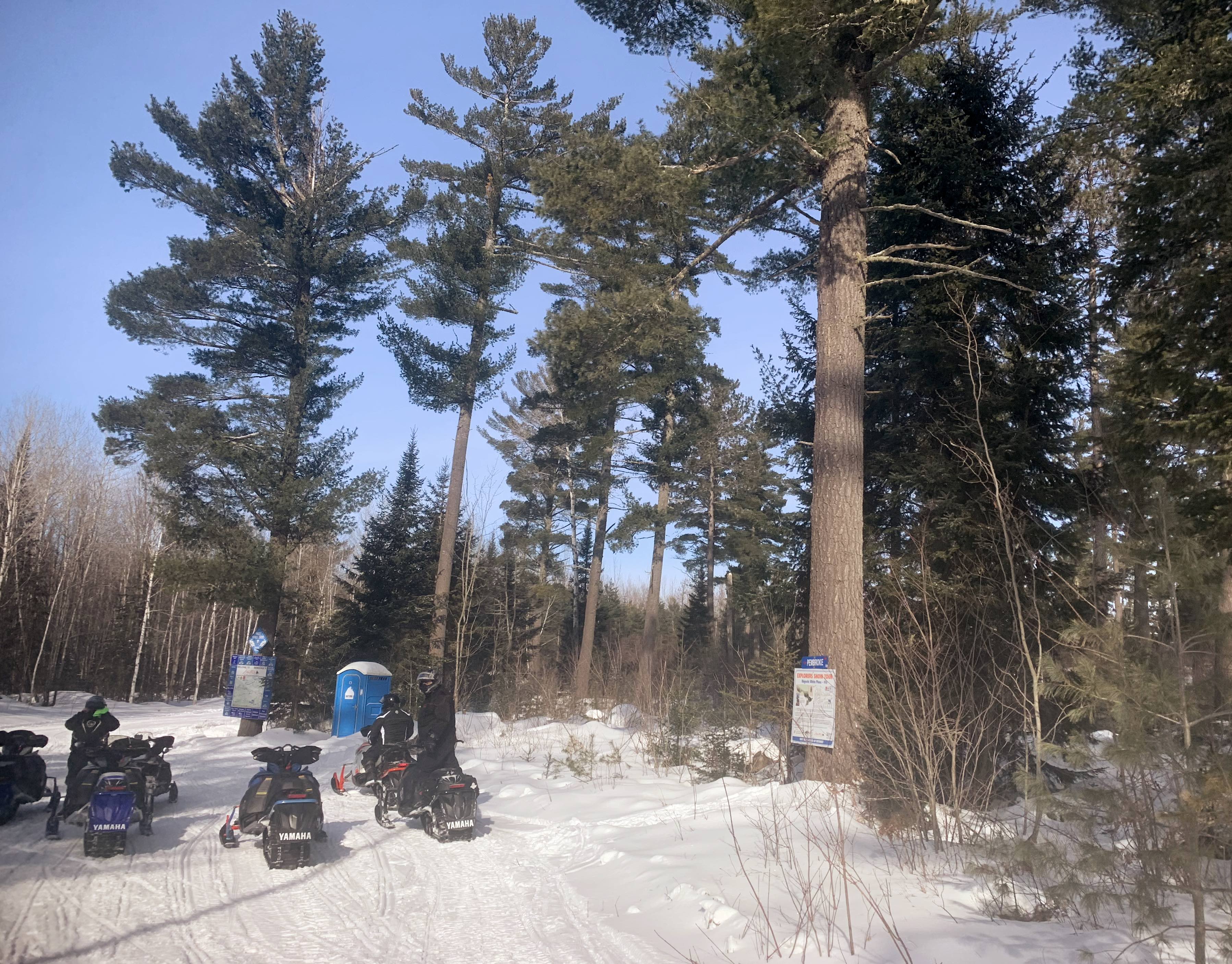 Snowmobiles at Majestic White Pines - Explorers Snow Tour