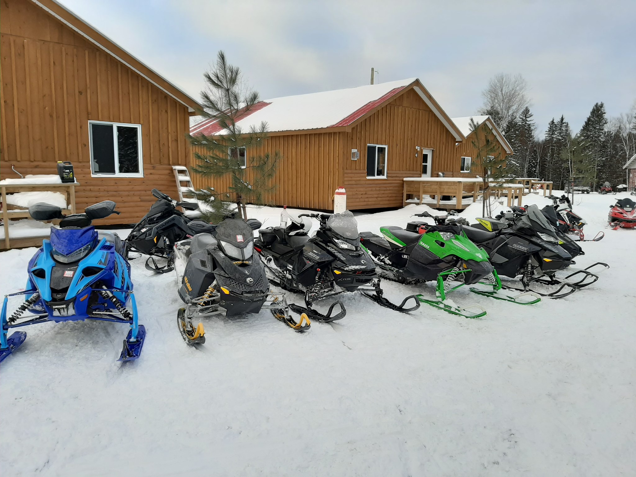 Cabins with snowmobiles