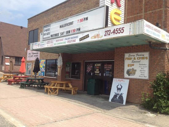 Theatre entrance with picnic tables