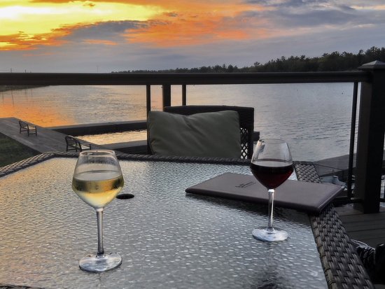 Wine on patio looking out over Blind River