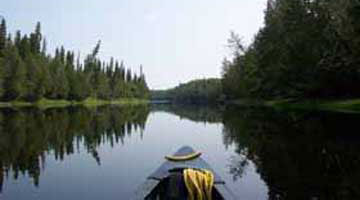 Kayak floating down a river