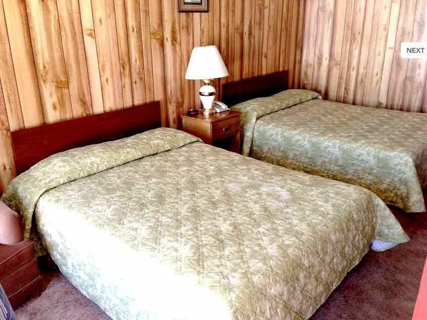 Two double beds in motel room