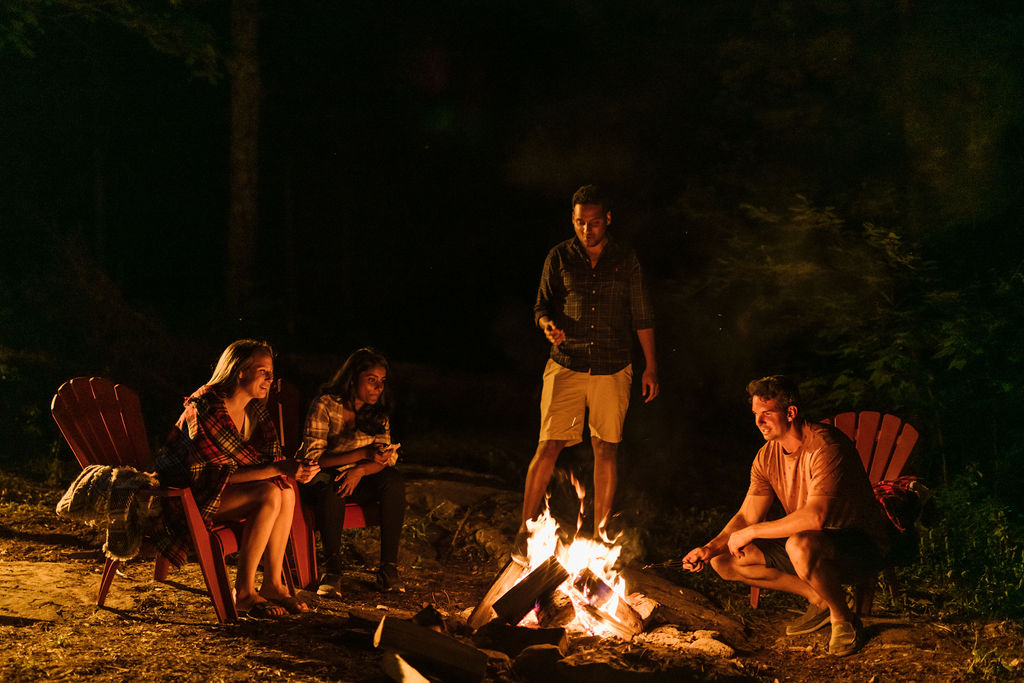 People sitting around the fire