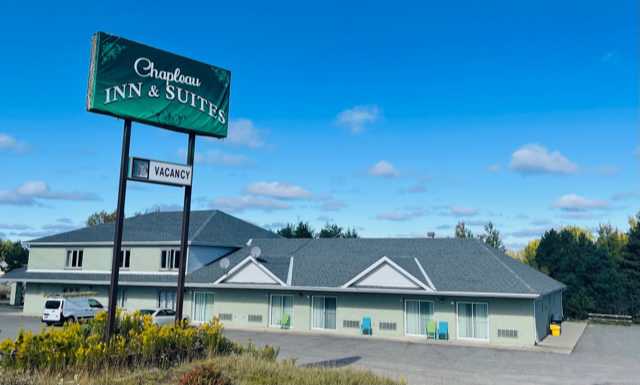 Exterior of Motel with sign