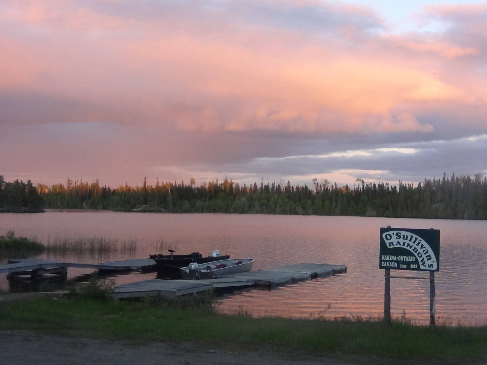 Waterfront with dock and sign