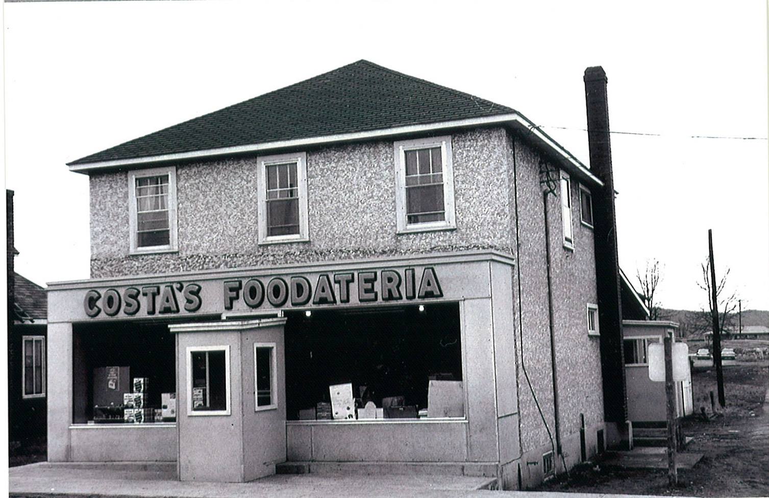 Black and white photo of grocery store