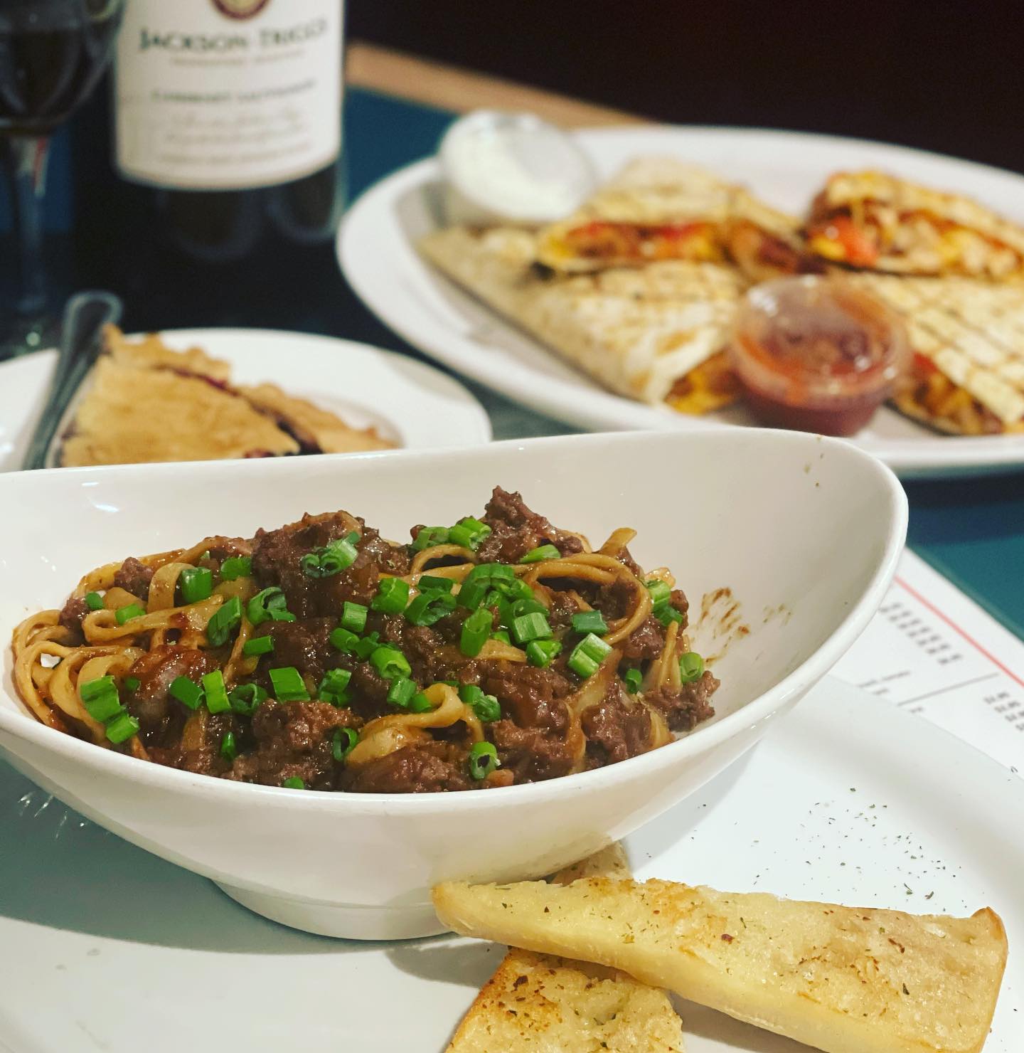 a bowl of meat and noodles