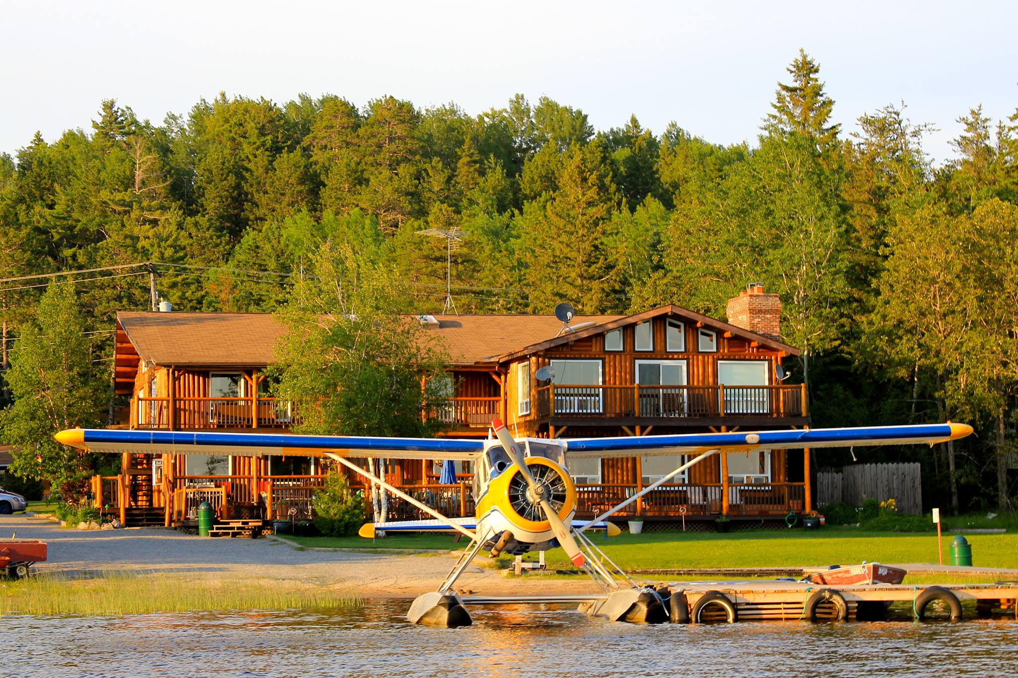 Float plane in front of lodge