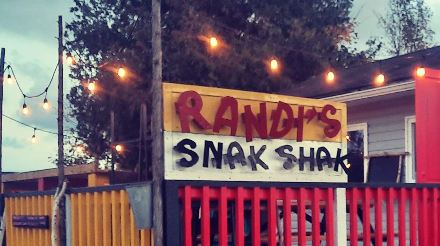 Patio with sign at restaurant