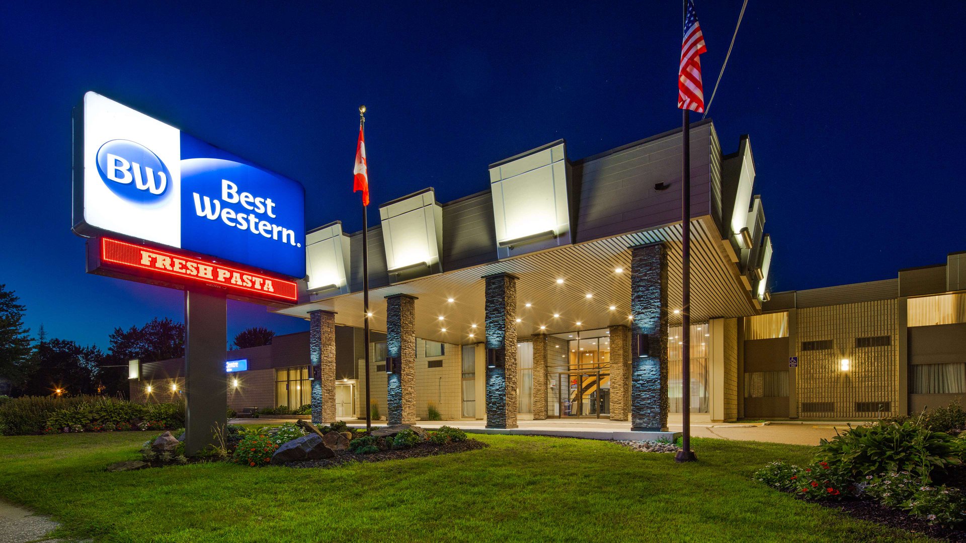 Exterior of hotel with sign