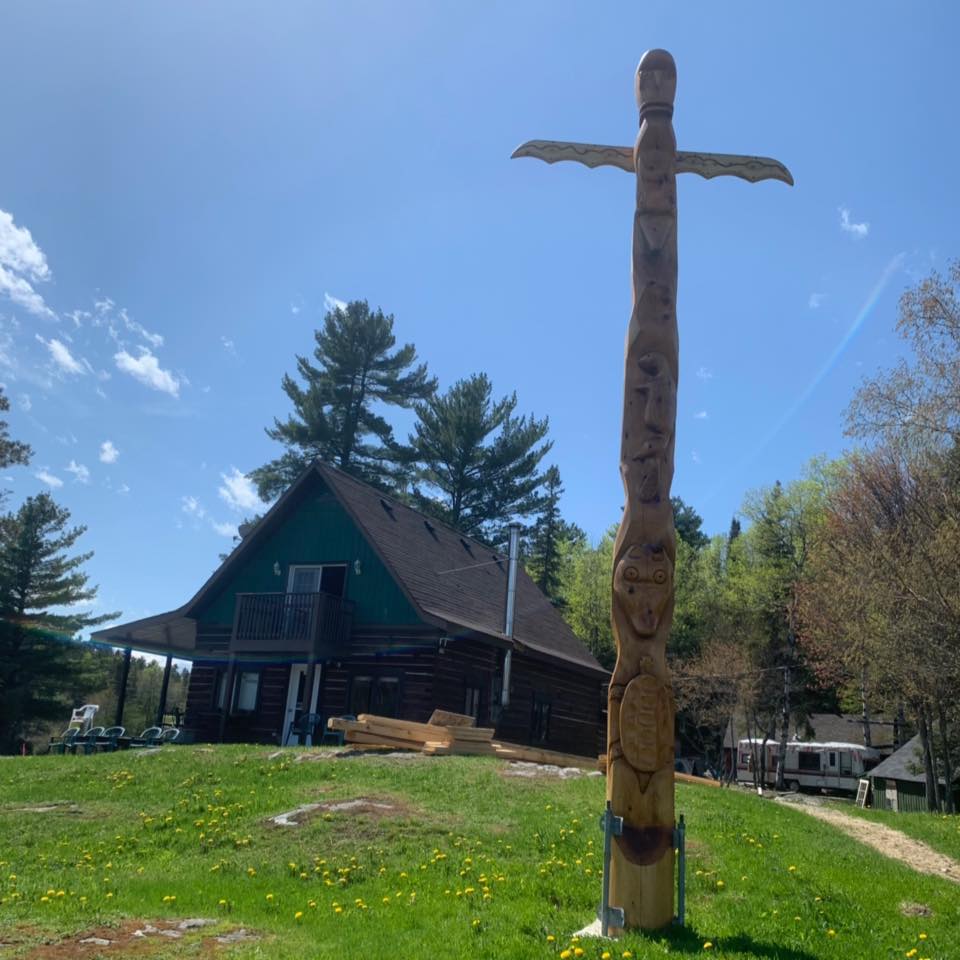 Cabin with totem pole