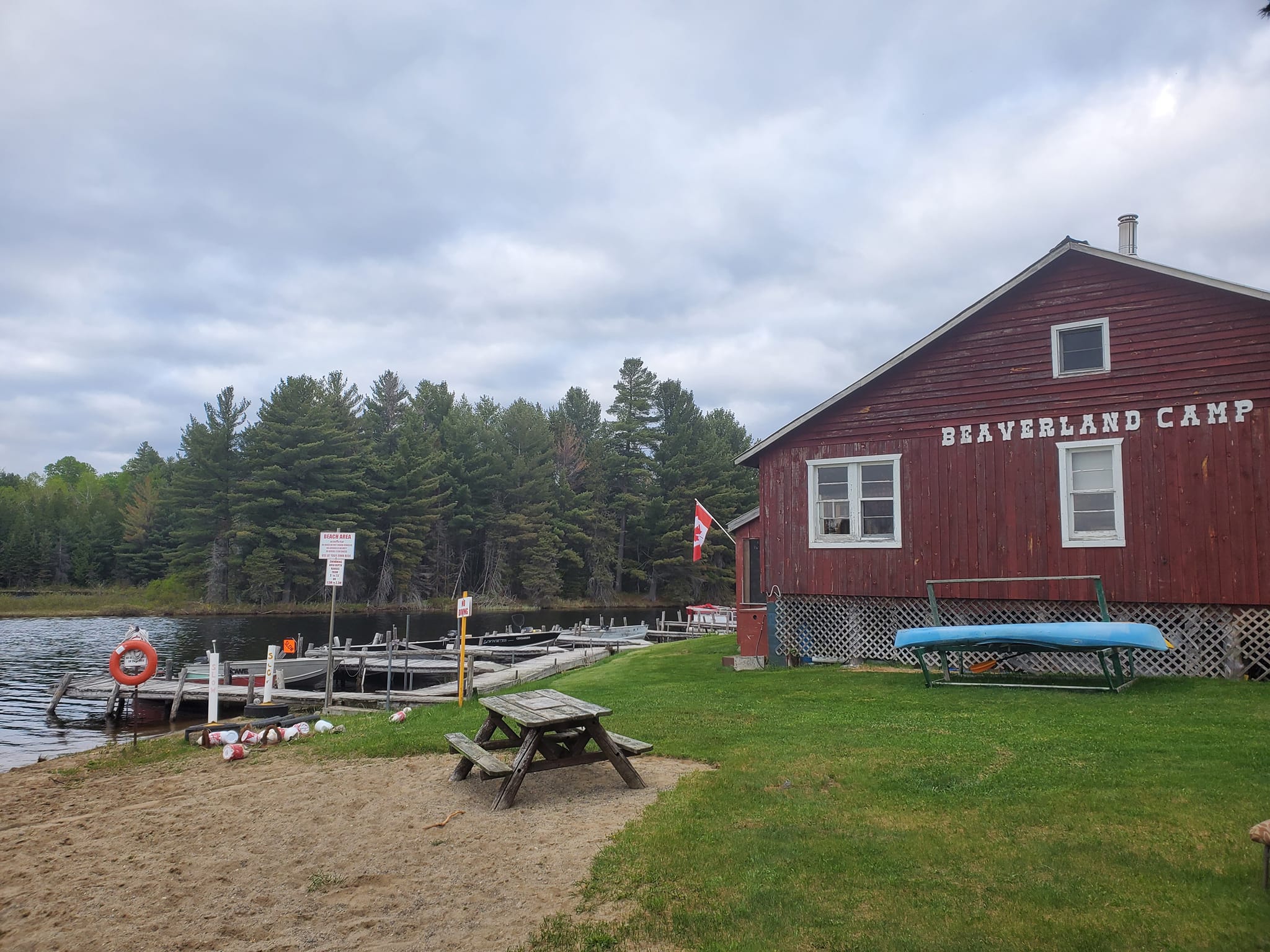 Lodge at the side of water with boats