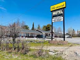 Exterior of motel with sign