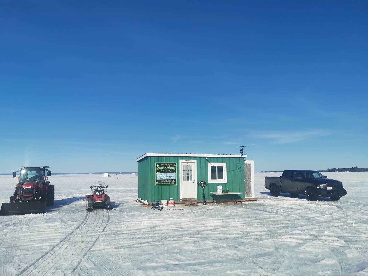 Ice hut on lake