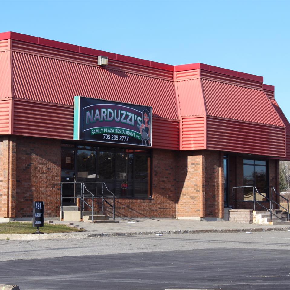 Exterior of restaurant with sign