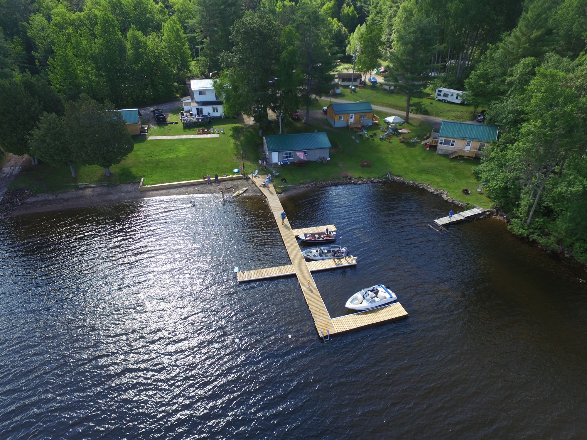 Arial view of cottages and lake front