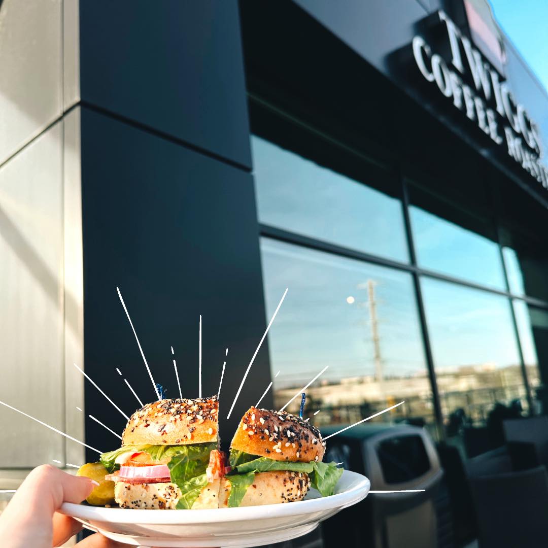 Bagel on plate outside shop