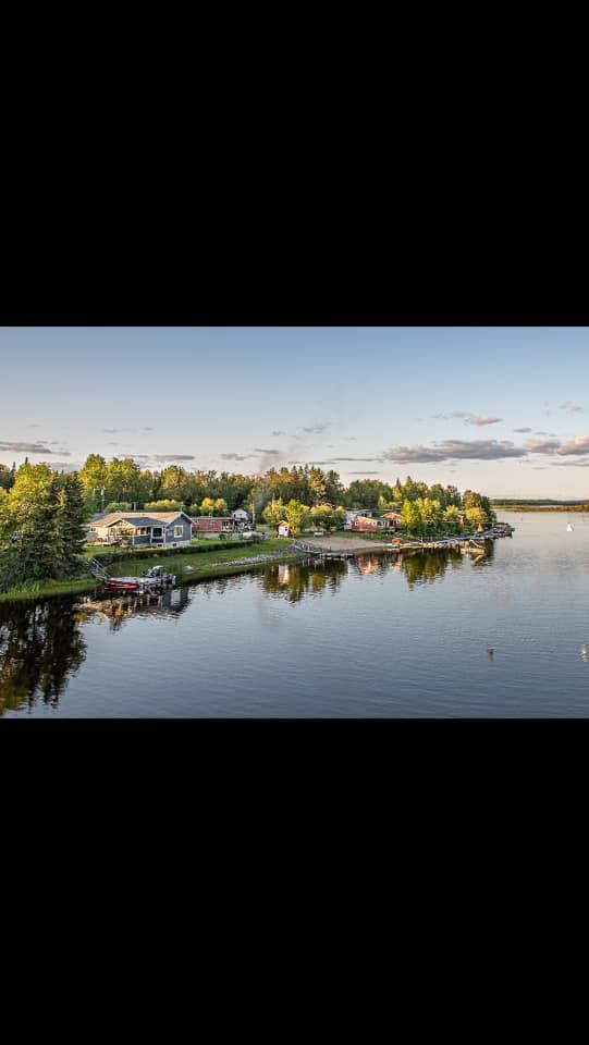 Waterfront view with cabins