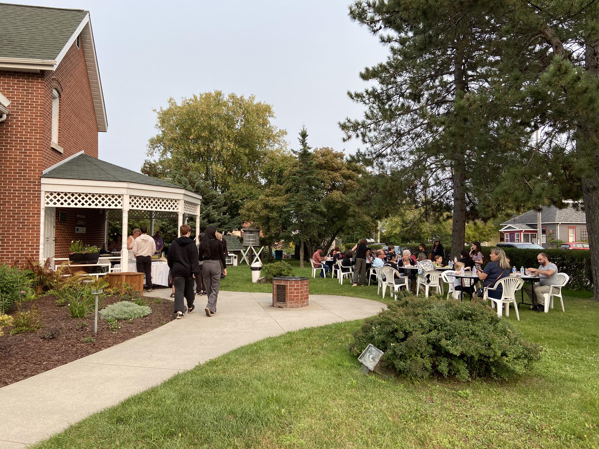 People enjoying food outside of the museum