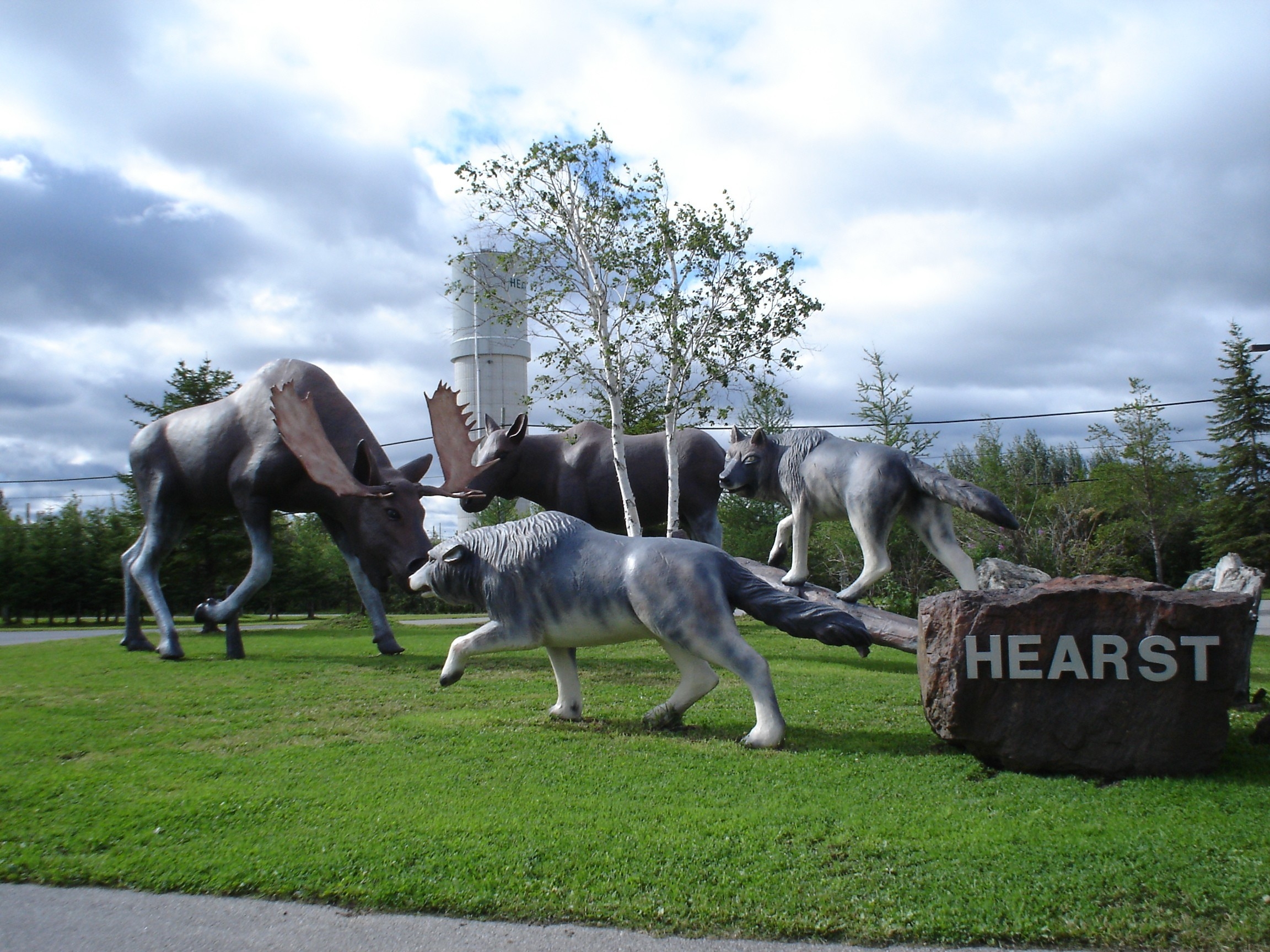 Wolves and moose statue