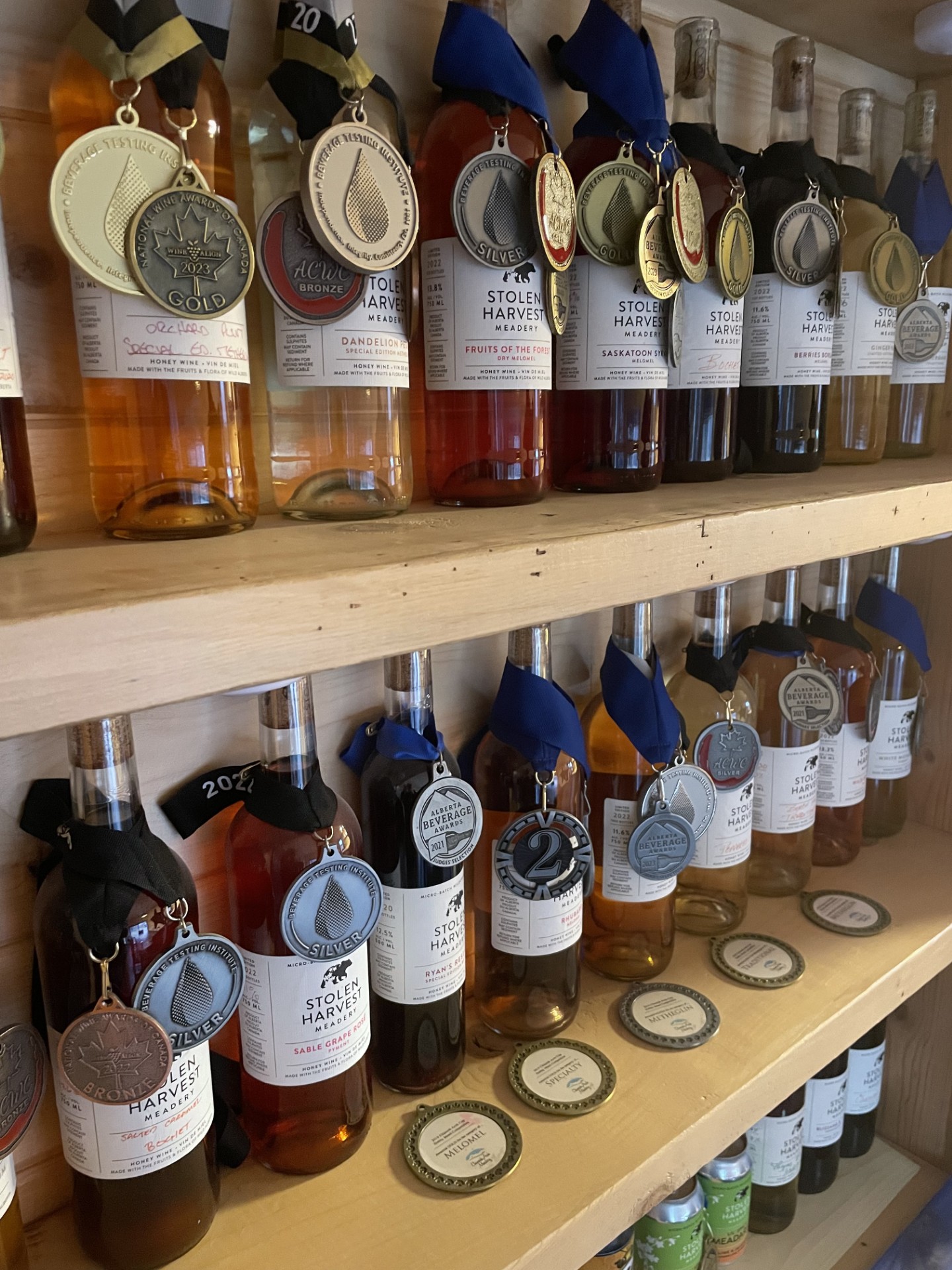 a wall with bottle of distilled alcohol