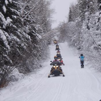 snowmobilers on trail