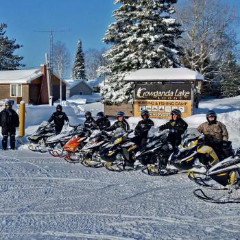 Gowganda Lake snowmobilers and sign