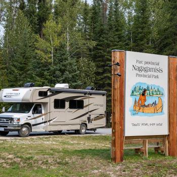 Nagagamisis Provincial Park welcome sign and RV