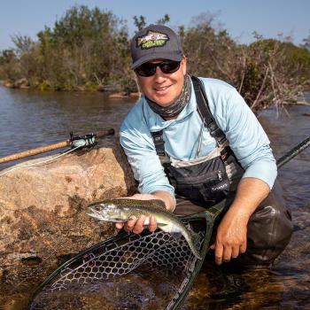 angler holding atlantic salmon