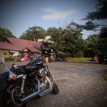 motorcycle parked outside black creek outfitters