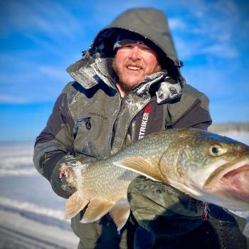 Ice fishing for lake trout at Vic & Dot's Camp on Whitefish Bay