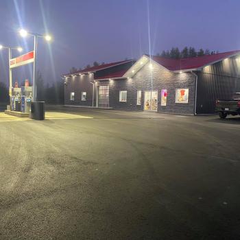 Exterior of building with gas pumps