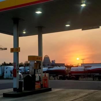 Gas pumps at sunset