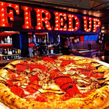 Pizza with neon sign