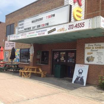 Theatre entrance with picnic tables