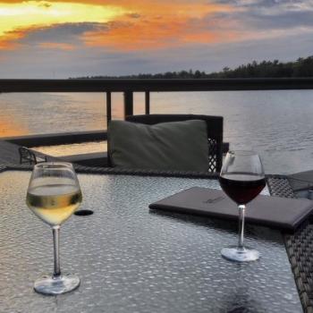 Wine on patio looking out over Blind River