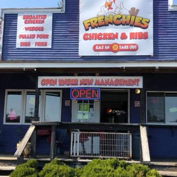 Exterior of restaurant with sign