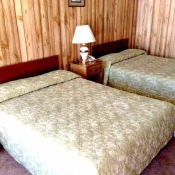 Two double beds in motel room