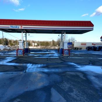 Gas pumps in front of restaurant