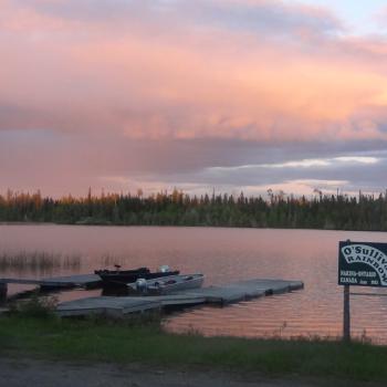 Waterfront with dock and sign