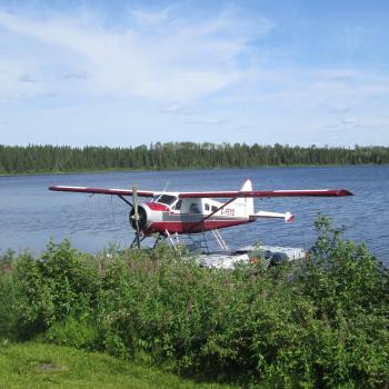 Float plane sitting on lake