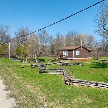 cabin in field