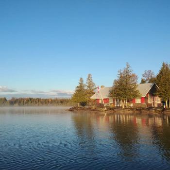 cabin on shore of lake